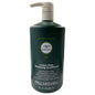 Paul Mitchell Tea Tree Lemon Sage Thickening Conditioner bottle with label, 33.8 oz, natural hair care product.