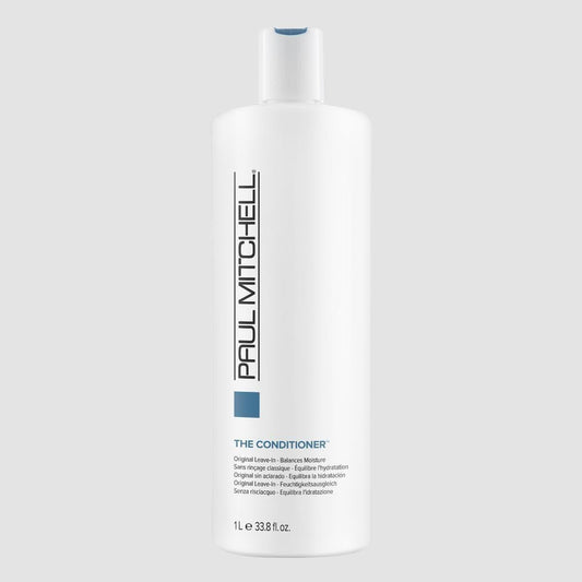 Paul Mitchell The Conditioner 33.8 oz bottle, moisturizing hair conditioner with a sleek design, suitable for all hair types