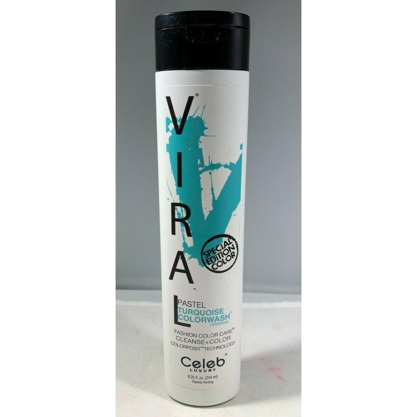 Celeb Luxury Pastel Turquoise Viral Colorwash conditioner in 8.25 oz bottle, vibrant pastel turquoise color, for hair color treatment.