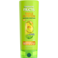 Garnier Fructis Triple Nutrition nourishing conditioner bottle, 12 fl oz, with colorful label and description visible.