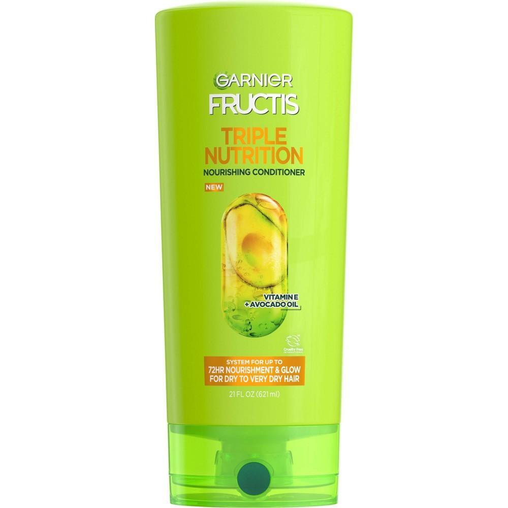 Garnier Fructis Triple Nutrition Conditioner for dry to very dry hair, 21 oz, in a conditioner bottle with a flip-top cap.