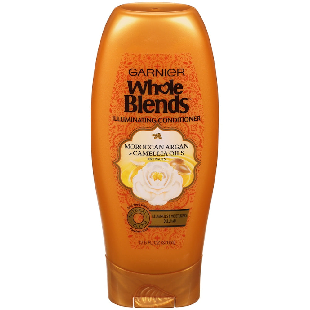 Garnier Whole Blends Illuminating Conditioner with Moroccan Argan and Camellia Oils in a 12.5 fl oz bottle, for shiny hair.
