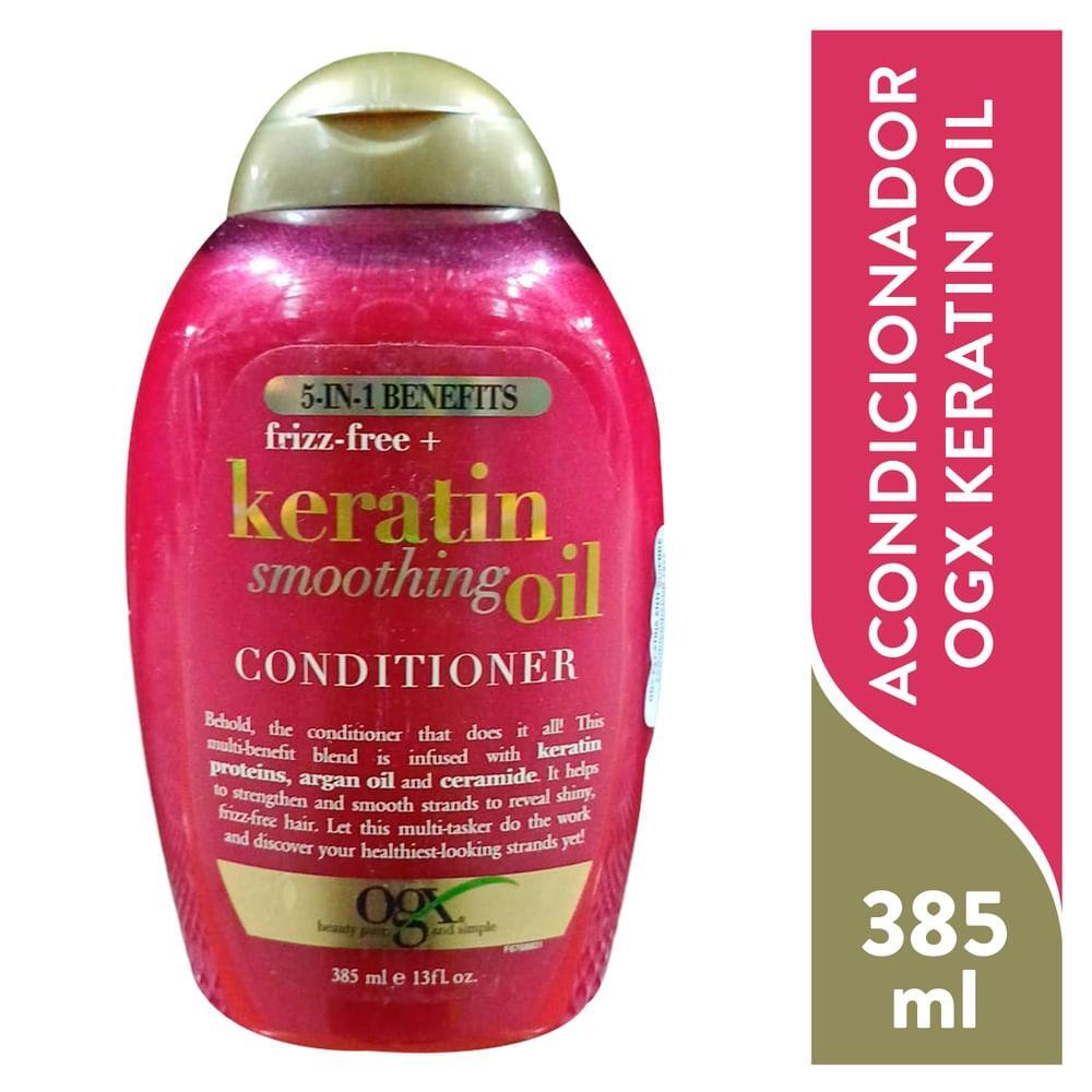 OGX Frizz-Free + Keratin Smoothing Oil Conditioner bottle, 13 fl oz, for frizz control and sleek hair styling
