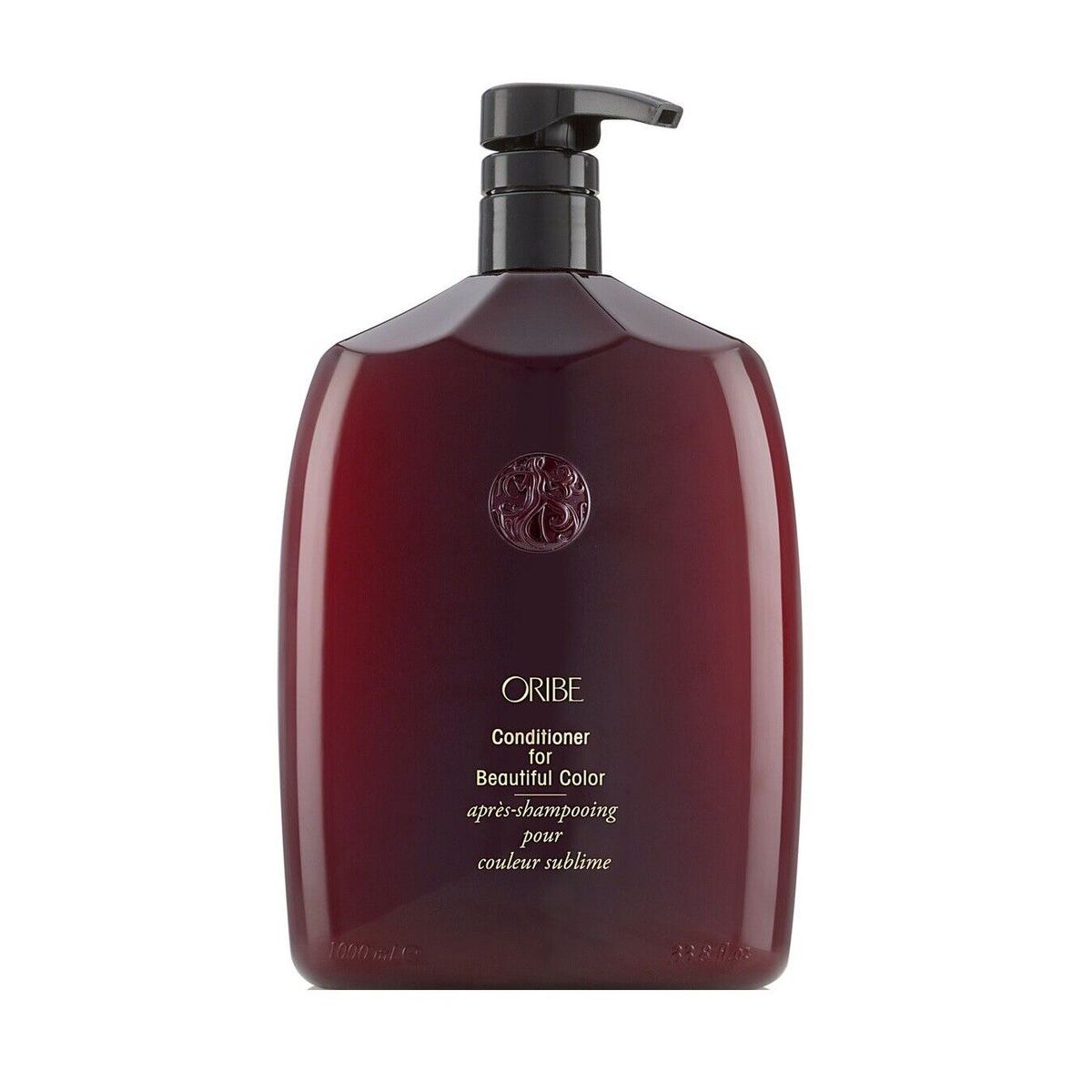 Oribe Er For Beautiful Color conditioner in a sleek bottle, designed to enhance and protect vibrant hair color.