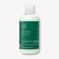 Paul Mitchell Tea Tree Special Conditioner bottle showing green and white packaging with the product label visible.