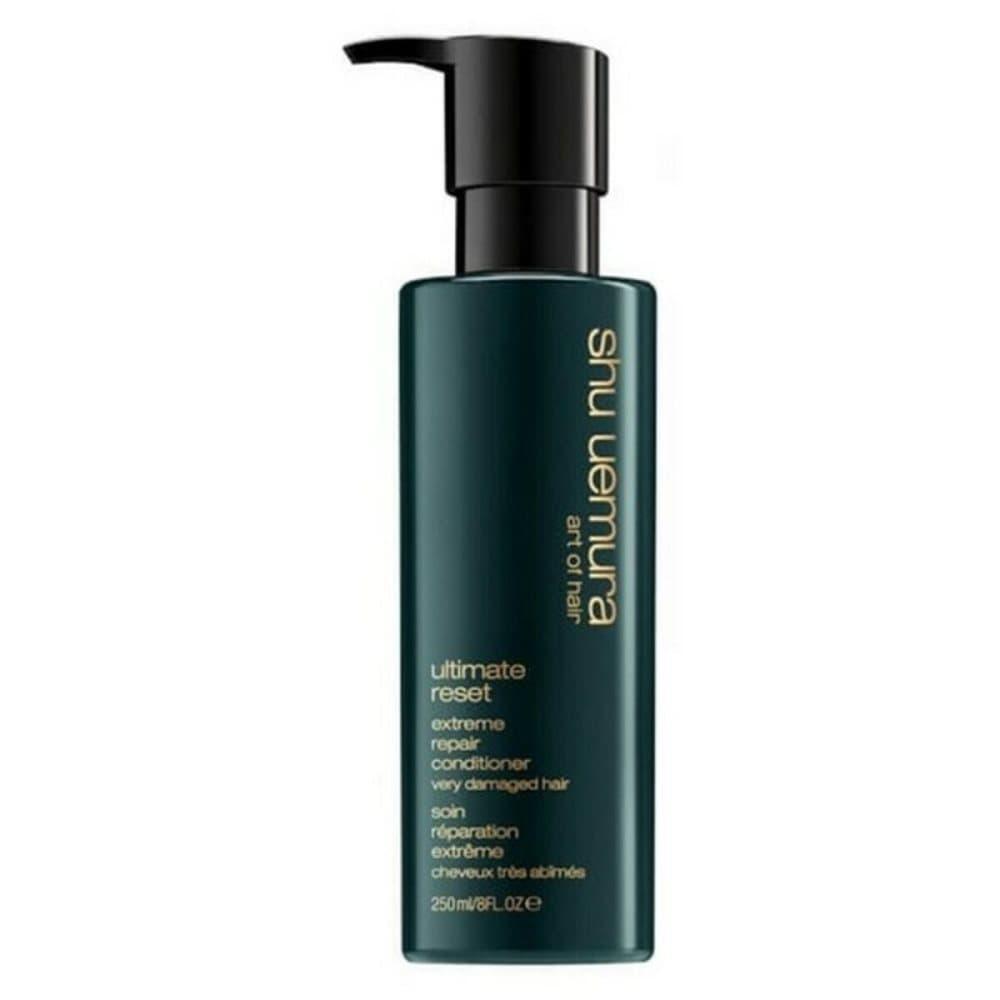Shu Uemura Ultimate Reset Conditioner 500ml bottle, creamy formula for restoring damaged hair, with brand and product details visible.