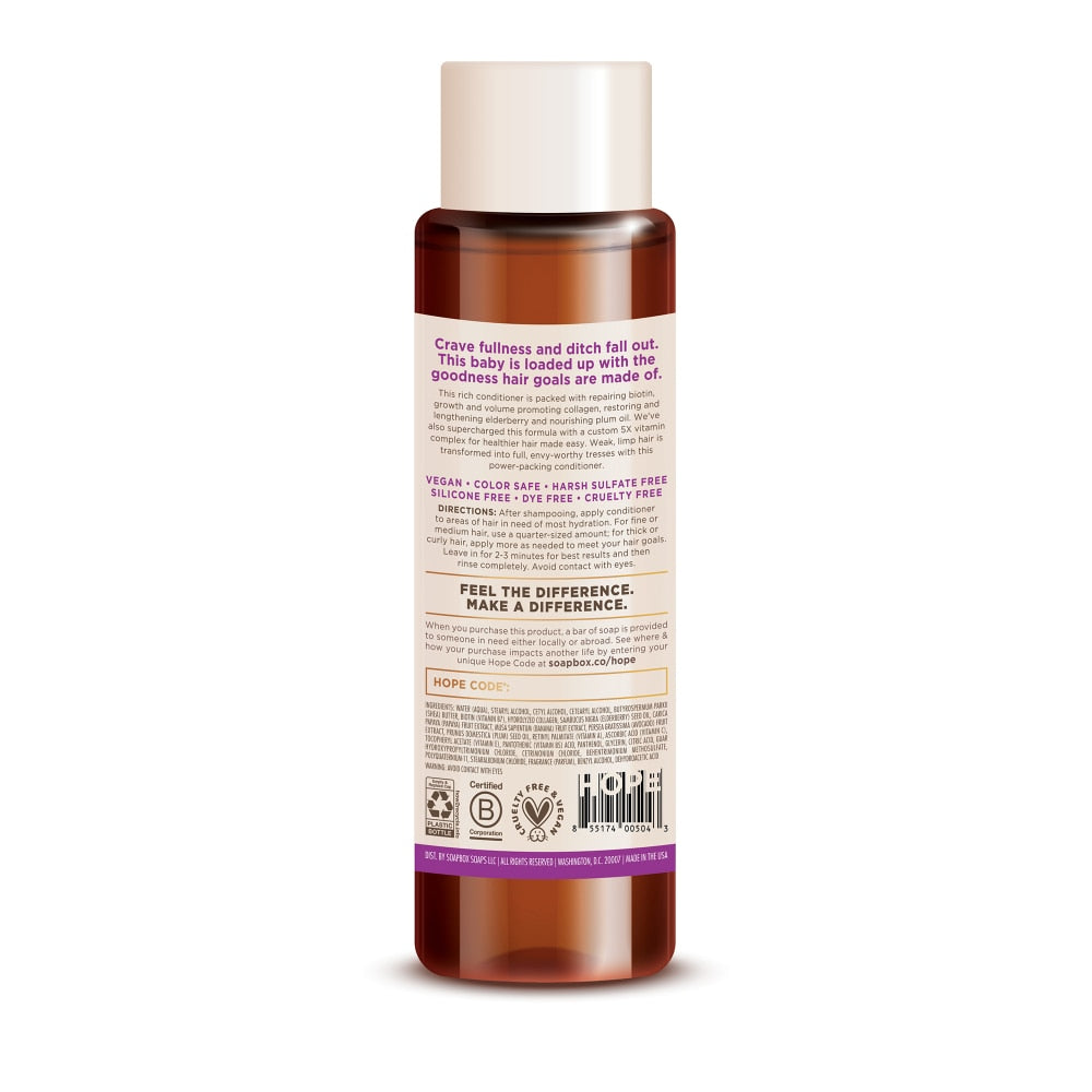 Soapbox Biotin & Superfruit Blend Restore & Volumize Conditioner in 16 fl oz bottle, highlighting natural ingredients and product packaging.