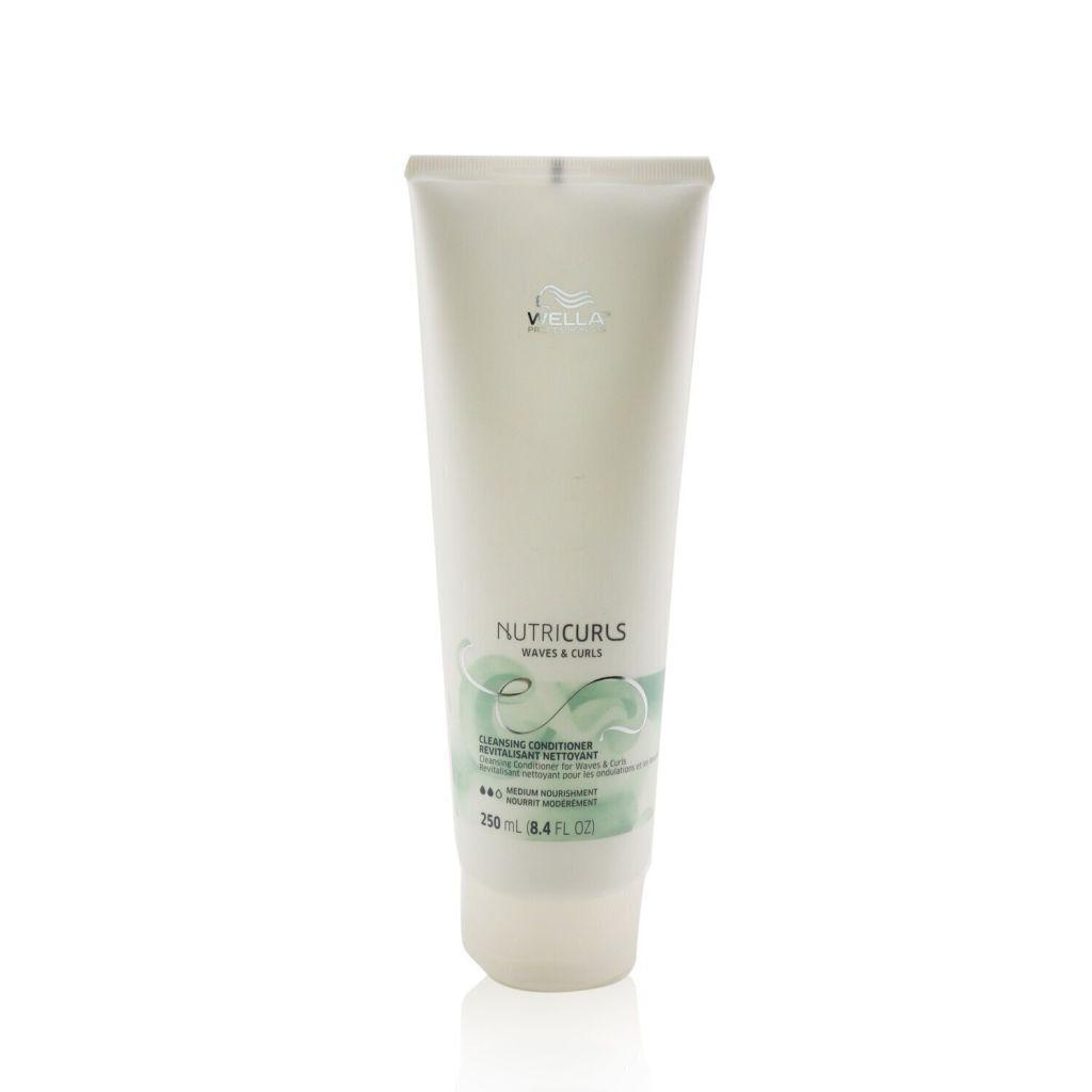 Wella Nutricurls cleansing conditioner for waves and curls, natural hair care product, in a white bottle with blue accents.