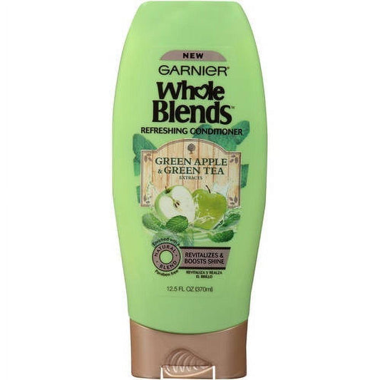Garnier Whole Blends Green Apple Conditioner in a 12.5 fl oz bottle, nourishing hair with natural green apple extract.