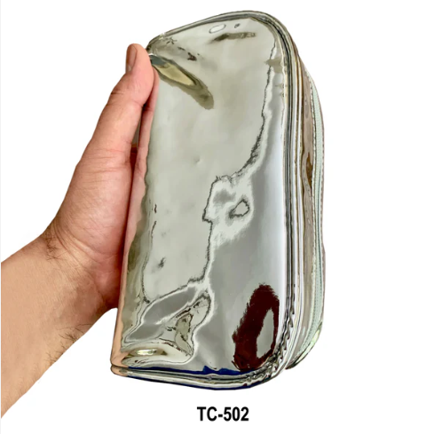 Silver metal Kingsley travel cosmetic and toiletry organizer bag by Pasteur Pharmacy, with multiple compartments for makeup and toiletries.