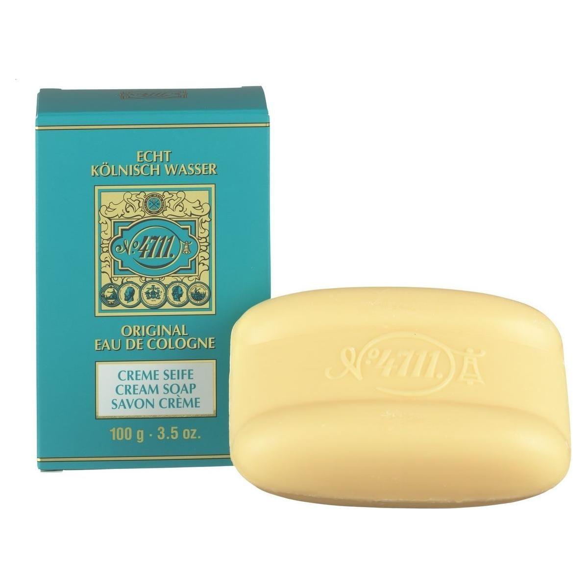 Cream soap by Muelhens 4711 Original Eau De Cologne, 3.4 oz, in a white bar with subtle branding and smooth texture.