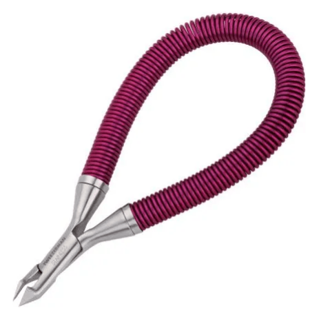 Tweezerman Grip and Snip spiral spring cuticle nipper in purple with ergonomic handles for precise cuticle trimming.