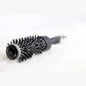 Keller Spiral Curler 25mm from Pasteur Pharmacy, showing the black curling iron with spiral barrel for creating curls.