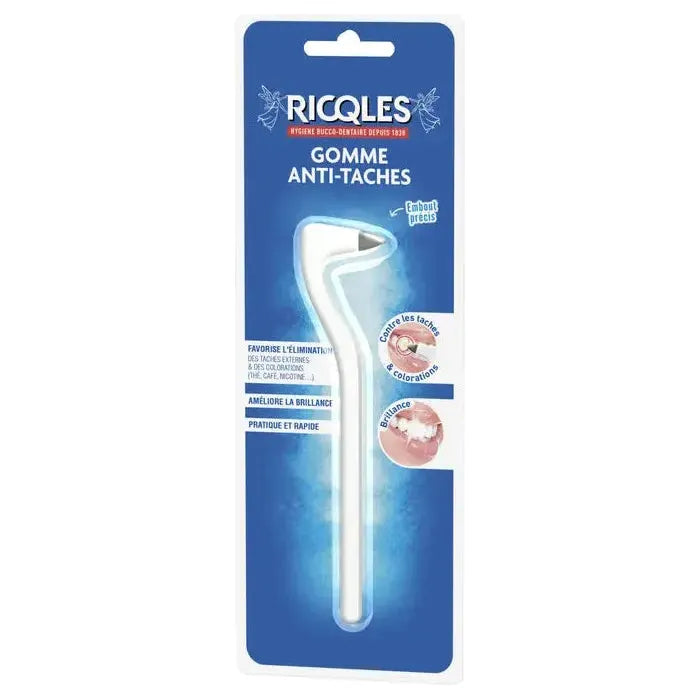 Ricqles Dental Stain Eraser from Pasteur Pharmacy, close-up of the stain removal tool with packaging in the background