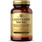Bottle of Solgar L-Glutamine 500mg dietary supplement capsules in a clear container with a label showing the product name.