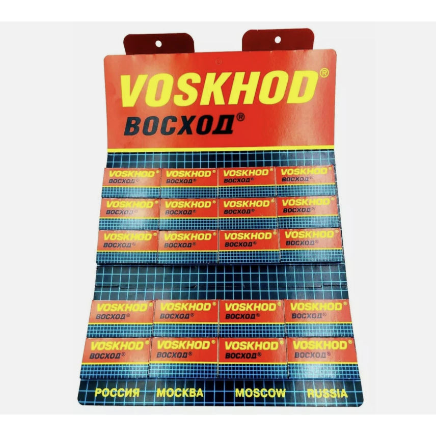Voskhod Teflon-coated double edge blades, 20 packs of 5, shown in a blister pack with sharp blades visible for safety and precision shaving.