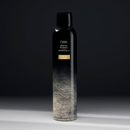 Oribe Gold Lust Dry Shampoo 300ml bottle with sleek packaging, designed for refreshing hair between washes.