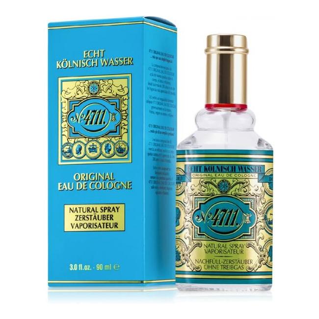 Muelhens 4711 Eau De Cologne spray in a clear glass bottle with a silver cap, displayed on a white background.