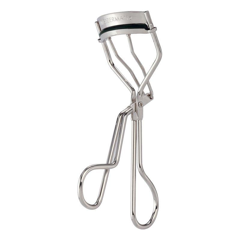 Tweezerman Deluxe Eyelash Curler with black handle and metal curling pad for precise eyelash curling.