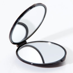 Pasteur Pharmacy M582 travel face mirror with 7X magnification and normal view, compact for easy portability.