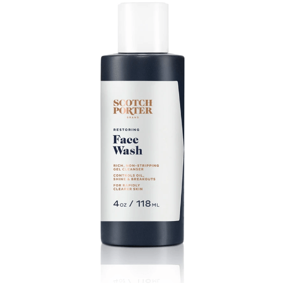 Scotch Porter Restoring Face Wash in 4 oz bottle, gentle cleanser for revitalizing skin, displayed in a clear plastic bottle