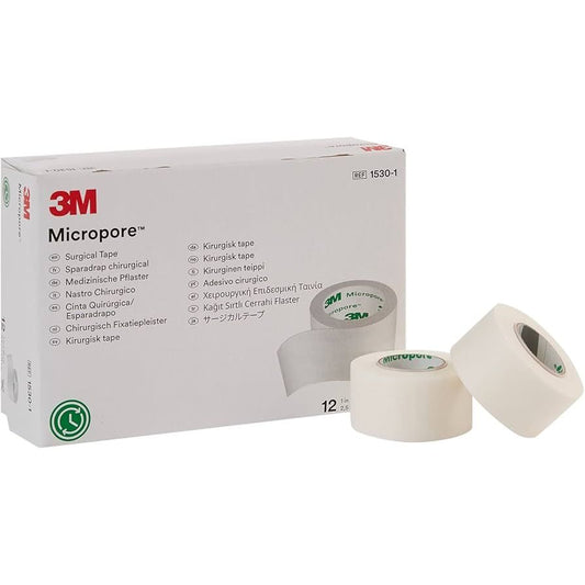 White 3M Micropore medical tape on rolls, 1 inch by 10 yards, used for first aid and surgical applications, in a box of 12 rolls.