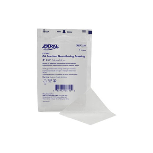 Sterile Dukal Corp Oil Emulsion Dressings in 3x3 inch size, packaged in a box of 50 for first aid wound care.