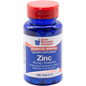 GNP Essential Mineral Zinc 50mg dietary supplement bottles with 100 tablets, used for fitness and nutrition support.