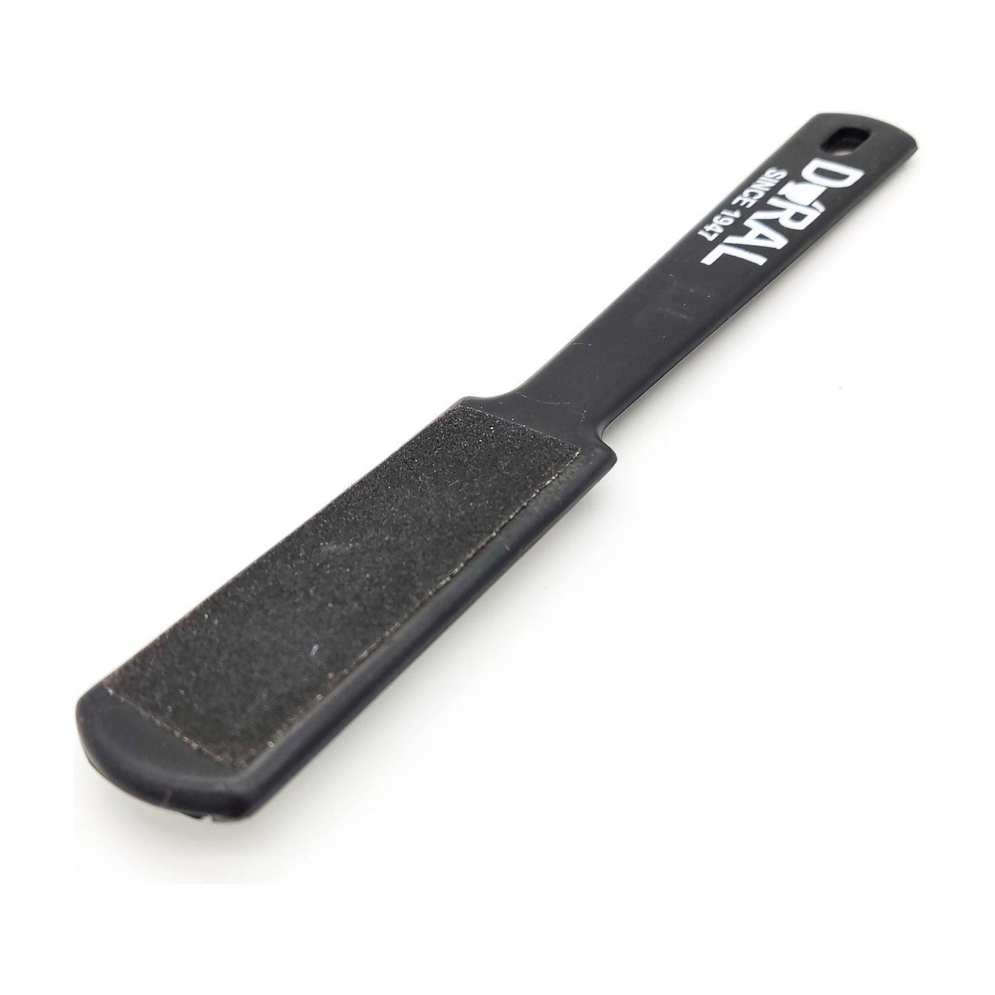 Black Dural Foot Rasp for foot care by Pasteur Pharmacy, featuring a textured surface for exfoliating and smoothing feet.