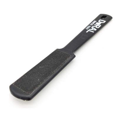 Black Dural Foot Rasp for foot care by Pasteur Pharmacy, featuring a textured surface for exfoliating and smoothing feet.