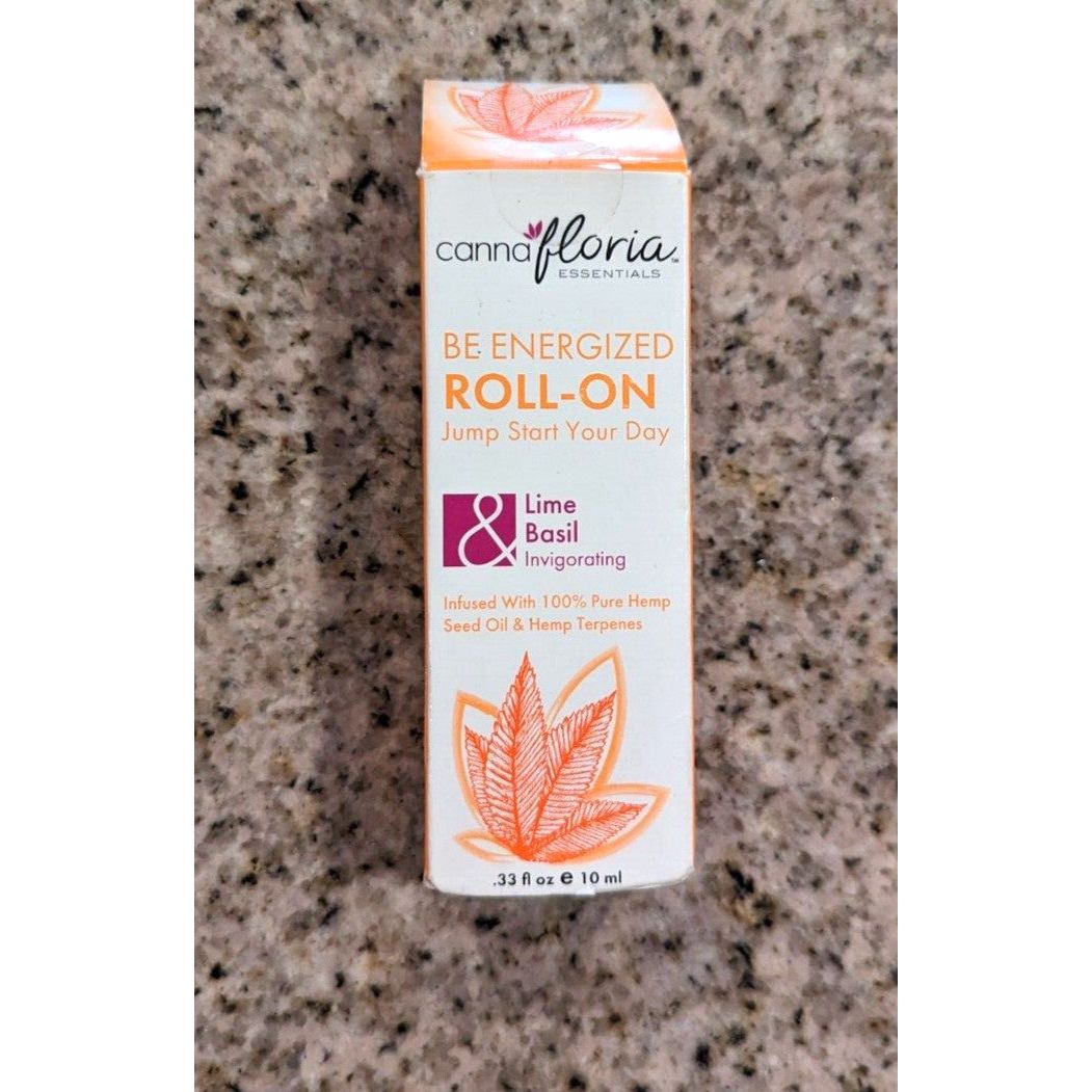 Cannafloria Essentials Be Energized Lime & Basil scented roll-on essential oil in a sleek glass bottle with a white cap.