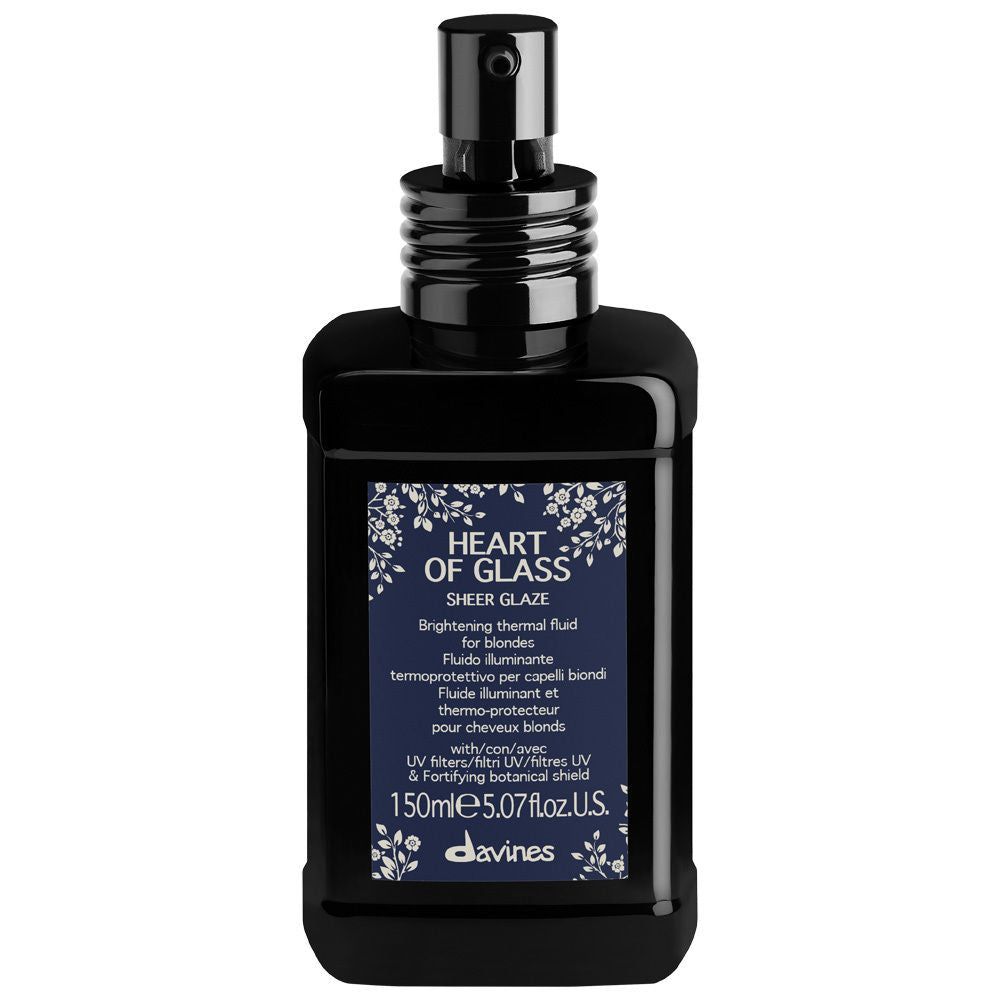 Davines Heart Of Glass Sheer Glaze glass jar, 150ml, smooth hair gloss and shine treatment with a sleek transparent container.