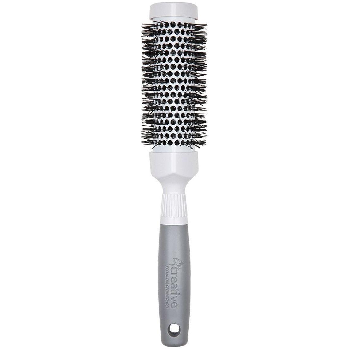 Pasteur Pharmacy Pro Ceramic Triangle Hair Brush with sleek design, featuring ceramic coating for smooth, shiny hair.