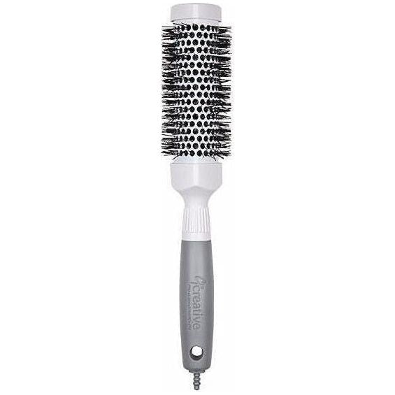 Pro Ceramic Triangle Hair Brush by Pasteur Pharmacy, showcasing a sleek ceramic hairbrush with a triangle shape and ergonomic handle.