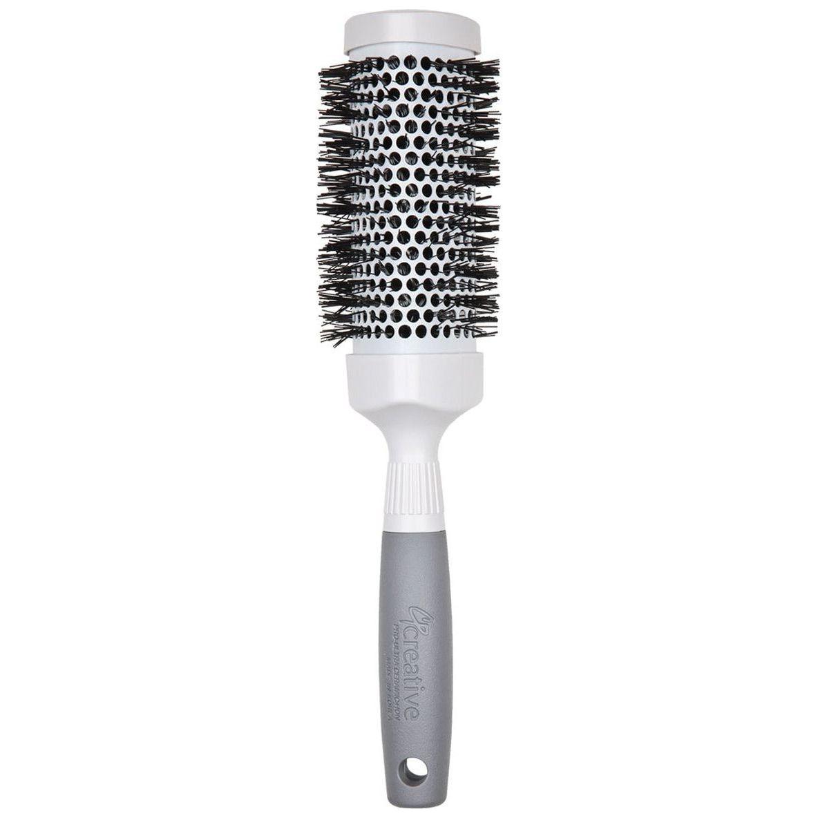 Pasteur Pharmacy Pro Ceramic Triangle Hair Brush with ergonomic handle and ceramic bristles for smooth styling.