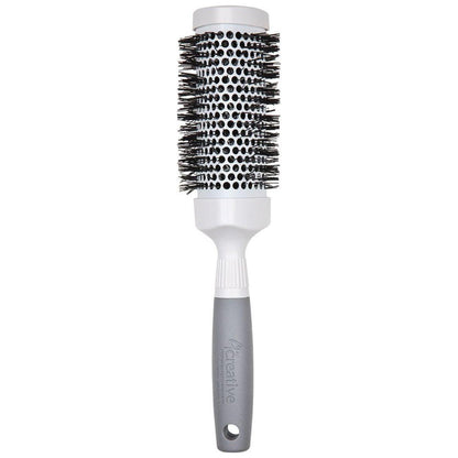 Pasteur Pharmacy Pro Ceramic Triangle Hair Brush with ergonomic handle and ceramic bristles for smooth styling.