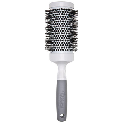 Pro Ceramic Triangle Hair Brush by Pasteur Pharmacy, featuring a sleek ceramic design and ergonomic handle for styling.