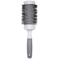 Pro Ceramic Triangle Hair Brush by Pasteur Pharmacy, featuring a sleek ceramic design and ergonomic handle for styling.
