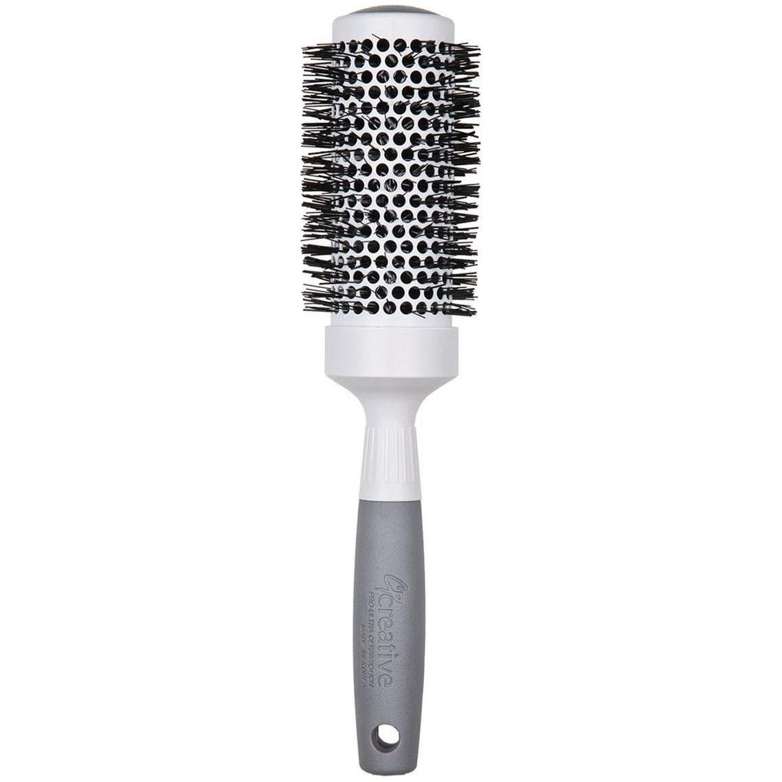 Pro Ultra Ceramic Thermal Round Hair Brush by Pasteur Pharmacy, with a round design and ceramic coating for styling and heat distribution.