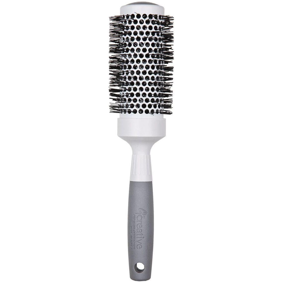 Pasteur Pharmacy Pro Ultra Ceramic Thermal Round Hair Brush with ergonomic handle and ceramic bristles for styling.
