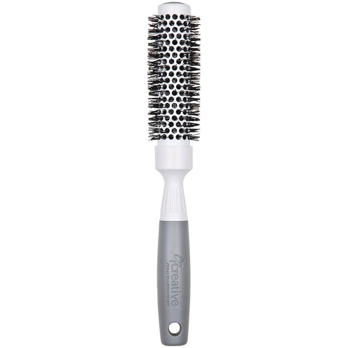 Pro Ultra Ceramic Thermal Round Hair Brush by Pasteur Pharmacy with ceramic coating and rounded bristles for styling and volumizing hair.