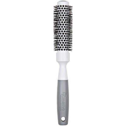 Pro Ultra Ceramic Thermal Round Hair Brush by Pasteur Pharmacy with ceramic coating and rounded bristles for styling and volumizing hair.