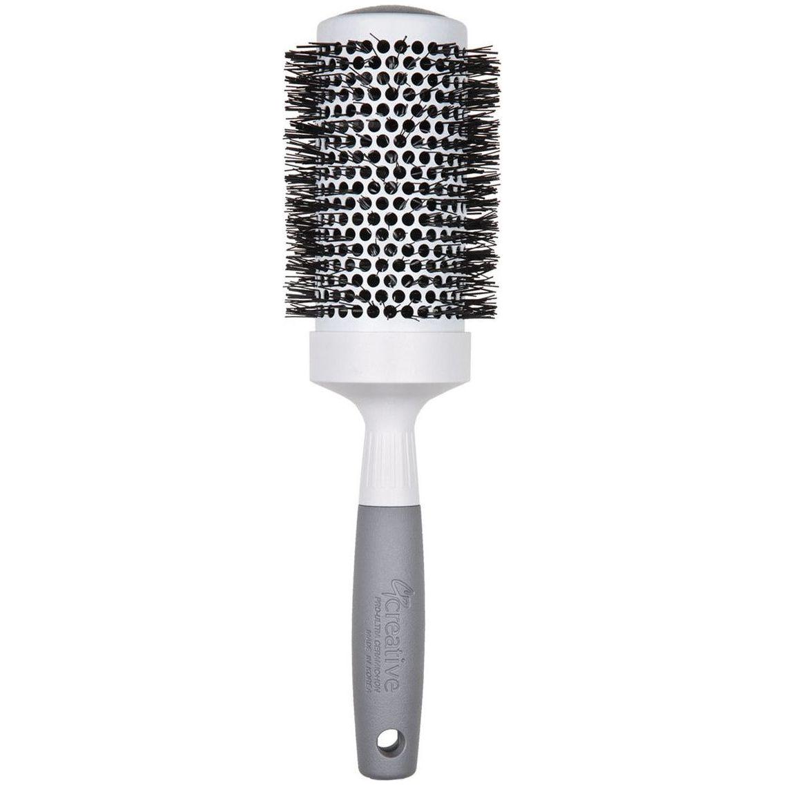 Pro Ultra Ceramic Thermal Round Hair Brush by Pasteur Pharmacy with ceramic barrel and bristles for styling and curling hair.