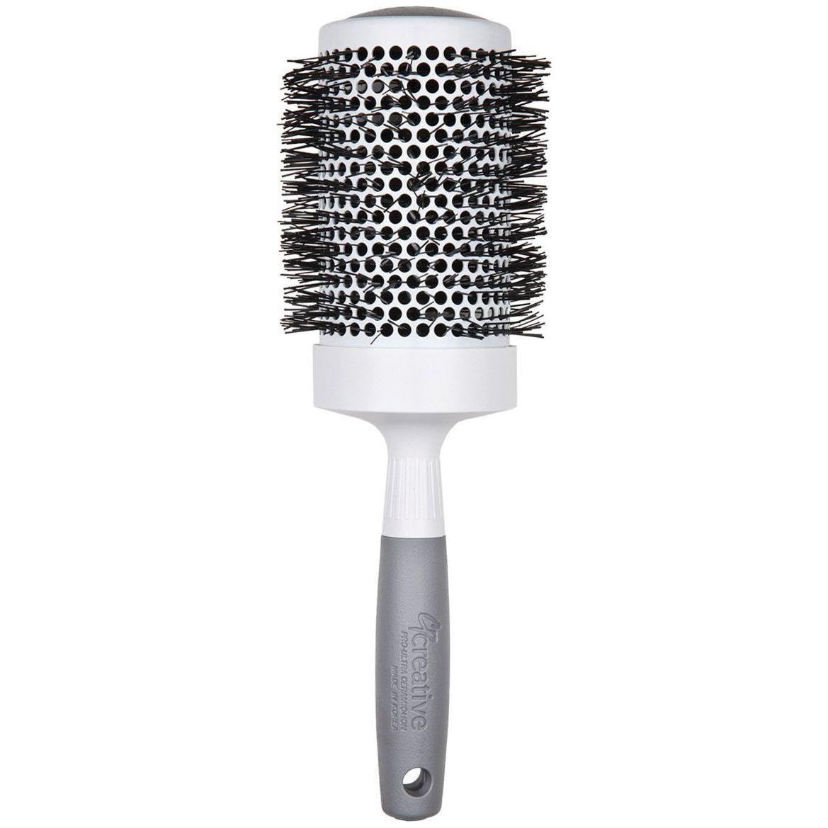 Pro Ultra Ceramic Thermal Round Hair Brush by Pasteur Pharmacy with a round wooden handle and ceramic bristles for styling.