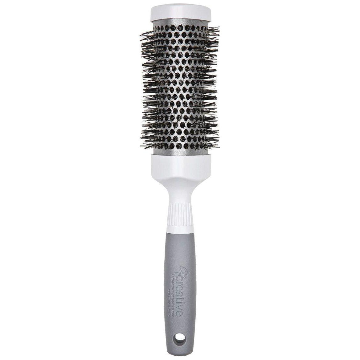 Silver Nano Ionic T-Curve Hair Brush by Pasteur Pharmacy, lightweight and ergonomic for smooth, tangle-free styling.
