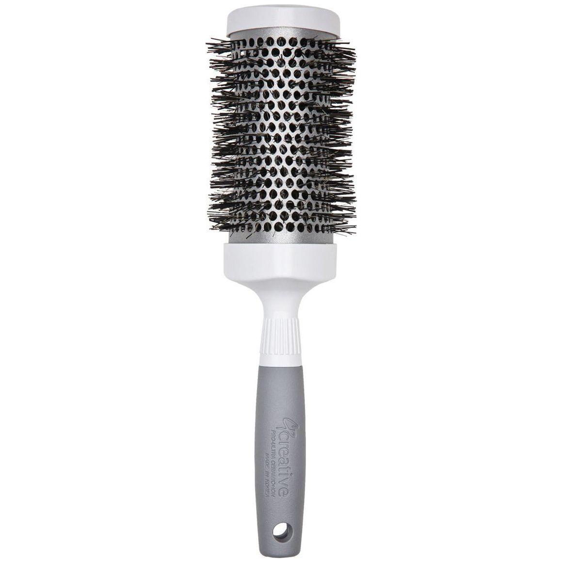 Silver Nano Ionic T-Curve Hair Brush by Pasteur Pharmacy, designed for smooth, shiny hair with ionic technology.