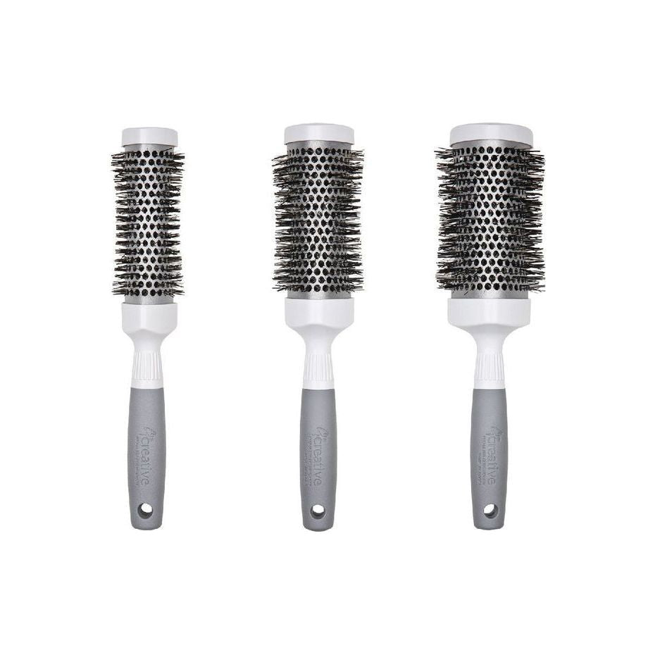 Silver Nano Ionic T-Curve Hair Brush by Pasteur Pharmacy, featuring ergonomic design and ionic technology for smooth styling.