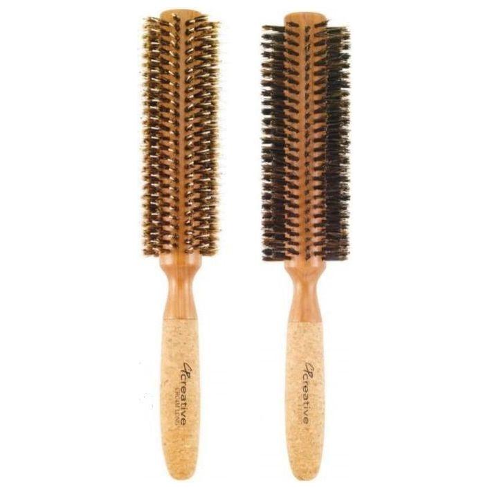 Eco-friendly extended 6-inch cork barrel round hair brush with boar bristles, designed for gentle styling and scalp comfort.