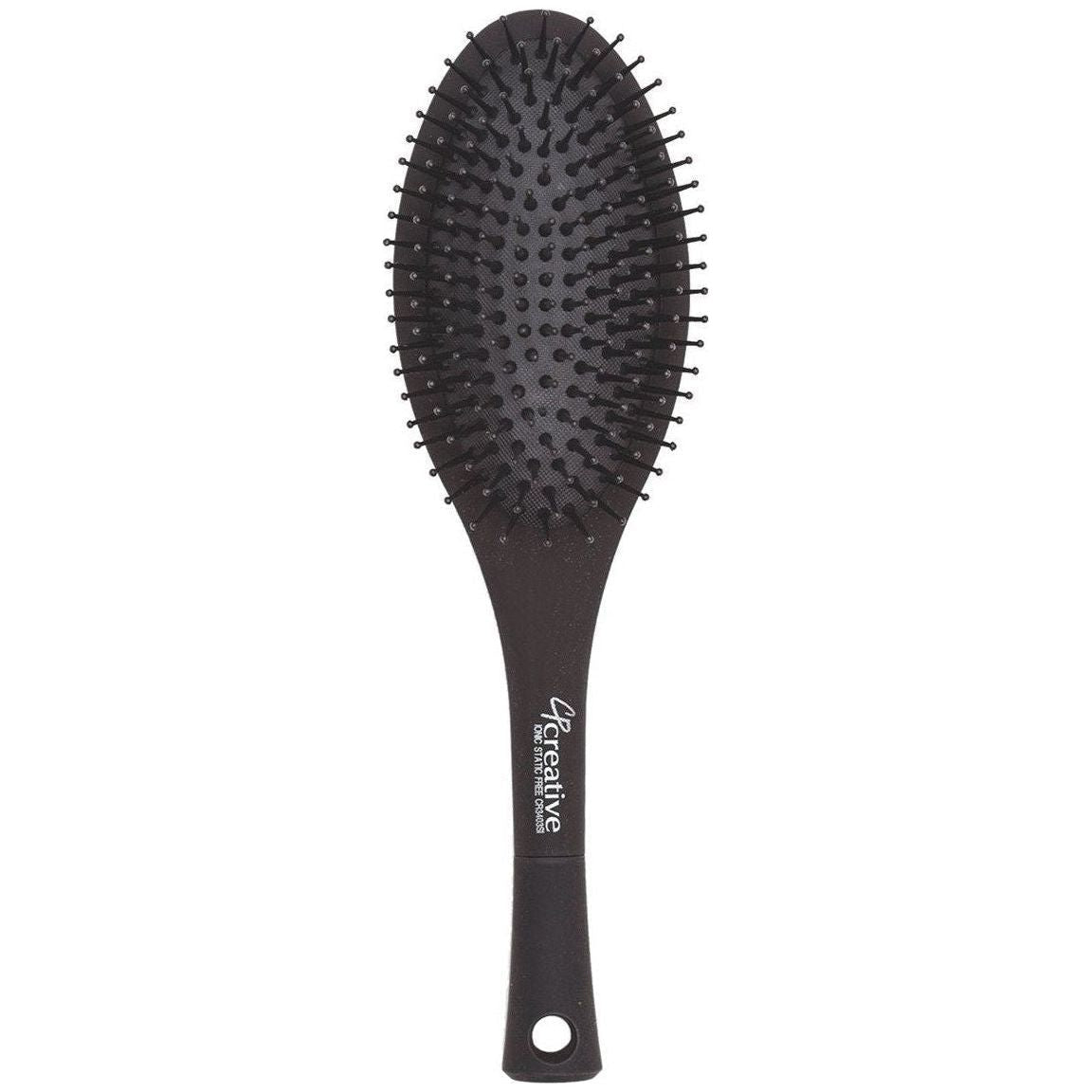 Pasteur Pharmacy static-free paddle hair brush with ergonomic handle, designed for gentle, tangle-free styling.