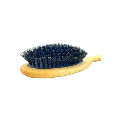 Dural Beech wood rubber cushion hair brush with boar bristles for gentle, effective hair detangling and styling.